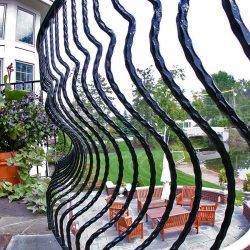 curved-exterior-staircase-with-wrought-iron-balcony-rail-great-lakes-metal-fabrication-img_5281194a0da71fd6_14-9581-1-27c50e6